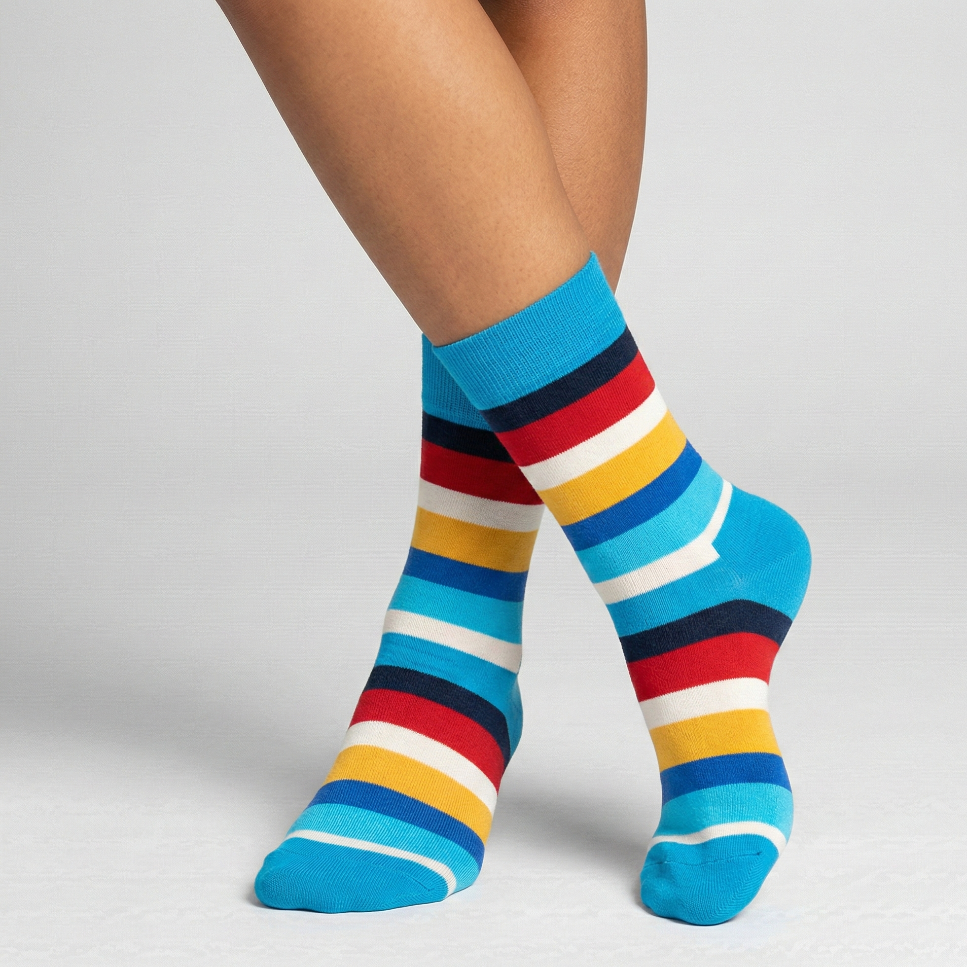 Colorful striped socks on a plain background
